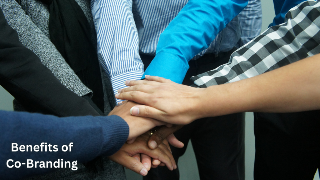 Hands shaking showing Benefits of Co-Branding 